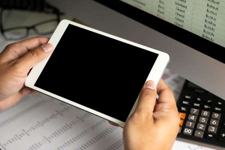 Accounting analysis businessman hand working Strategy Research analyzing financial data and chartsの写真素材