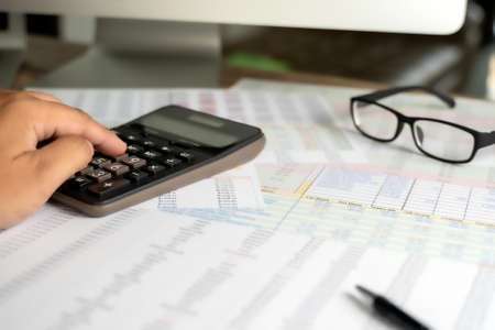 Accounting analysis businessman hand working Strategy Research analyzing financial data and chartsの写真素材