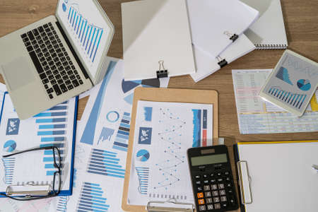 Financial Report- Business Accounting working and analyzing financial documents Analytics Statistics Information Business Technology.の写真素材