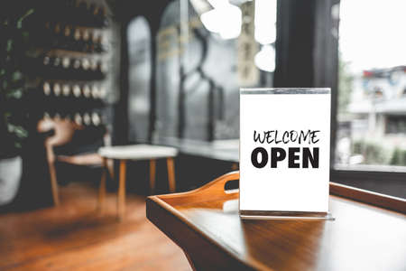 Come in we're open  in cafe owner open startup with cafe shopの写真素材