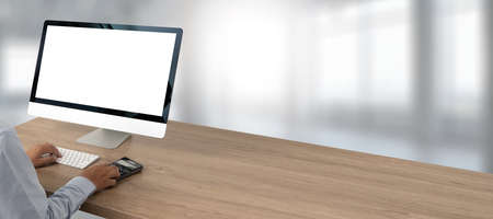 young man working Businessman using a desktop computer of the blank screenの写真素材