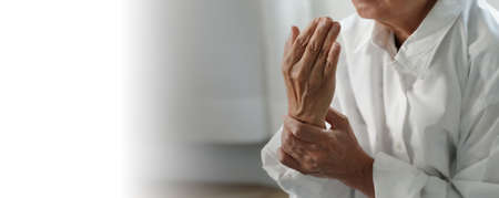 arthritis old person and Elderly woman female suffering from pain at home
