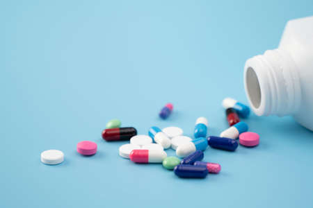 medical doctor writing prescription physician with stethoscope prescribing treatmentの写真素材