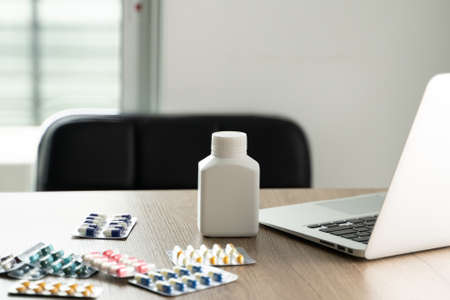 medical doctor writing prescription physician with stethoscope prescribing treatmentの写真素材