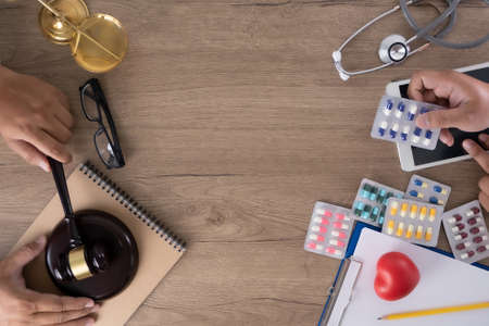 coffee on the wooden table from above. Urban coffee shop workspace or coffee break in morning