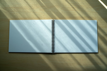 Blank plain notebook top view blank Design concept background for mockup book  page with stationary Blank plain notebookの写真素材