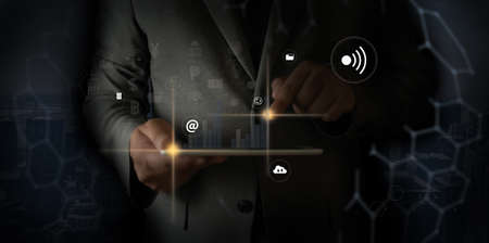 businessman using Searching Browsing Internet internet of things IoT internet in work Information...