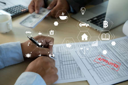 DEFINITION Business team hands at workの写真素材