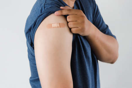 Blank screen laptop computer modern man use room laptop with blank white desktop screen with coffee cup on wooden table in cafeの写真素材