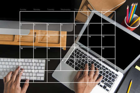 Blank screen laptop computer modern man use room laptop with blank white desktop screen with coffee cup on wooden table in cafeの写真素材