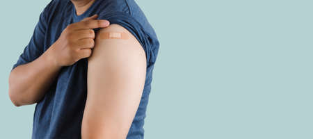 Blank screen laptop computer modern man use room laptop with blank white desktop screen with coffee cup on wooden table in cafeの写真素材