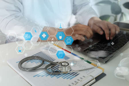 doctor analyzing medical report on network connection Healthcare business graph data  Healthcare investment and financial.の写真素材