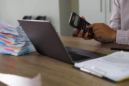 Asian woman enjoying a salt scrub massage at spa. Healthcare spa and massage thai concept  Girl receiving holistic massage treatment thai masseuse woman getting massageの写真素材