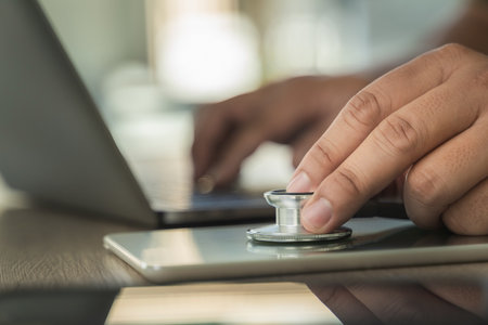 stethoscope computer and background doctor using laptop at desk medical network on Computing...