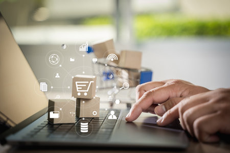 e-commerce marketing online shopping on a laptop Shopping and credit card payments for banking online, paper boxesの写真素材