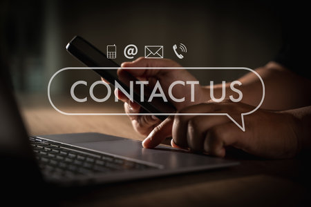CONTACT US (Customer Support Hotline people CONNECT ) Businessman touching phone application check ...