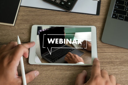 Webinar, Hands-on Table Use E-business Connection on Computer, Man Working From Home Participating in Online Group Communication WEBINARの写真素材