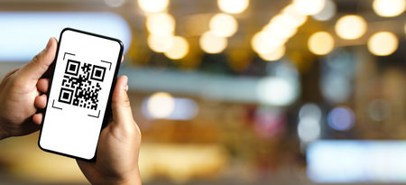 scanning QR codes with a mobile phone application and paying for goods and services in the retail...