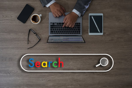 man search job on laptop computer device online browse internet webpage research find global Data...