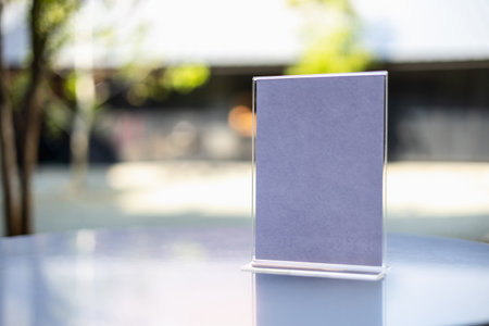 Stand Mock up Menu frame tent card blurred background design key visual layout in cafe