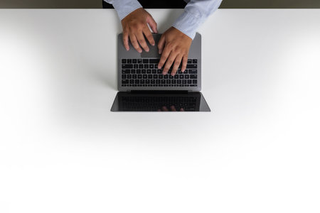 person happy using a computer notebook top view overhead copy workspace workplace planning top ideaの写真素材