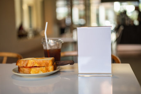 Stand Mock up Menu frame tent card blurred background design key visual layout in cafeの写真素材