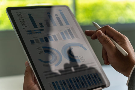 businessman professional working with digital tablet analyzing document strategy and chart professional strategy datum accounting tablet screenの写真素材