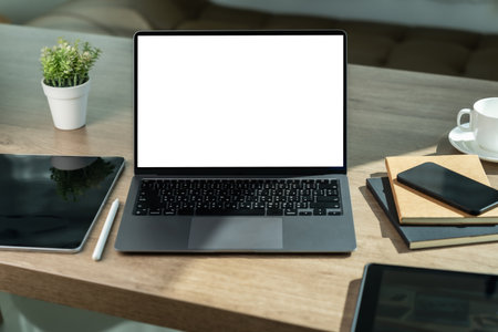 Laptop with blank screen on table. Workspace background new project on laptop computer with blank...