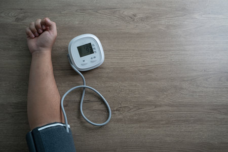 man checking blood pressure Health check blood pressure and heart rate at home