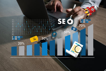 Using a laptop to create SEO (search engine optimization) material Technology for Business Marketing...