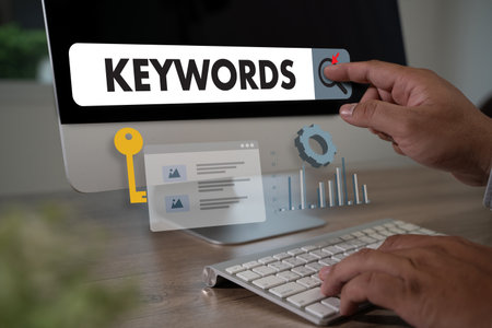 businessmanman search website for content keywords on laptop browse in office optimize seo engineの写真素材