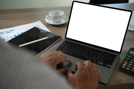 mock up Using laptop with blank screen computer modernの写真素材