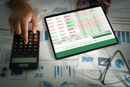 businessman working with data and graphs in spreadsheet documents for online analysis Microsoft Excel project dashboard accounting digitalの写真素材