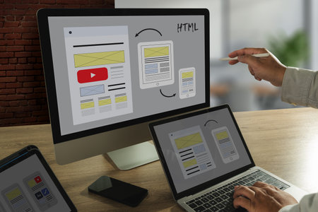 businessman web design responsive website layout and content. landing page development on a laptop...