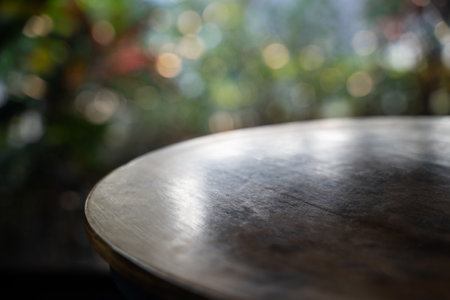 A wooden table with a black rim. The table is empty.の写真素材