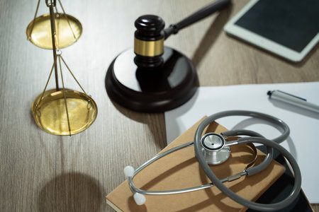 medicine law A doctor and a lawyer discussed health care, justice, and ethics in a clinic, balancing safety, rights, and responsibility.の写真素材