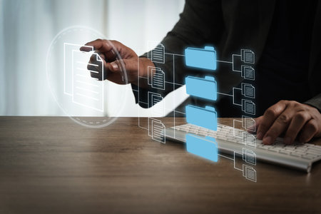 An office files report document person interacts with digital file management system, organizing folders and documents computer, symbolizing dataの写真素材