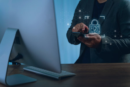 A data protection privacy person business suit using smartphone with digital lock icons and security...
