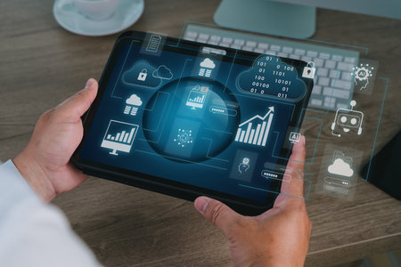User flowchart and business analytics with cloud computing and AI integration shown on a tablet,...