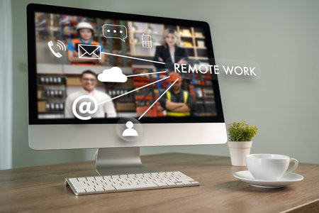 Modern home office workspace with a desktop computer showing remote work concept. Video conference...