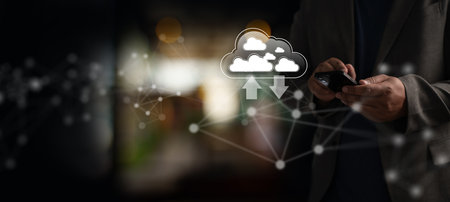 Cloud computing and data synchronization concept with secure online storage and mobility, shown by...