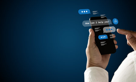 Chat interface automation concept with AI chatbot conversation and typing bubbles on smartphone...