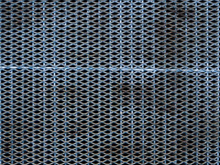 Steel grate of manhole cover duty drain on the roadside.の写真素材