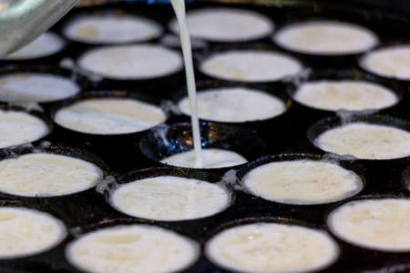 The process of making Kanom krok traditional Thai dessert.の写真素材