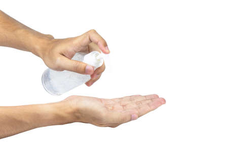 Man using squeezing hand sanitizer to palm. Sanitizing hands to protect from getting flu....