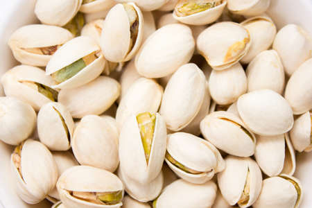 Close up of fresh pistachios. Whole background.