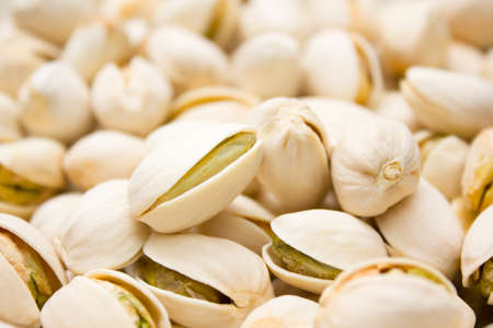 Close up of fresh pistachios. Whole background.