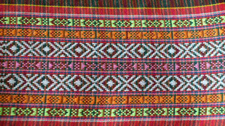 Colorful thai silk handcraft peruvian style rug surface close up More this motif & more textiles peruvian stripe beautiful background tapestry persian nomad detail pattern farabic fashionable textile.の写真素材