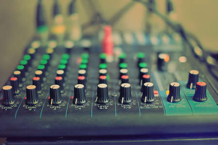 Mixing audio on desk for music with lighting effect,entertainment themesの写真素材