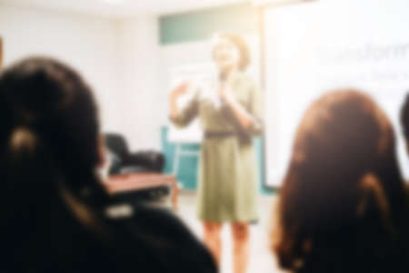 Blurred view of people at business trainingの写真素材
